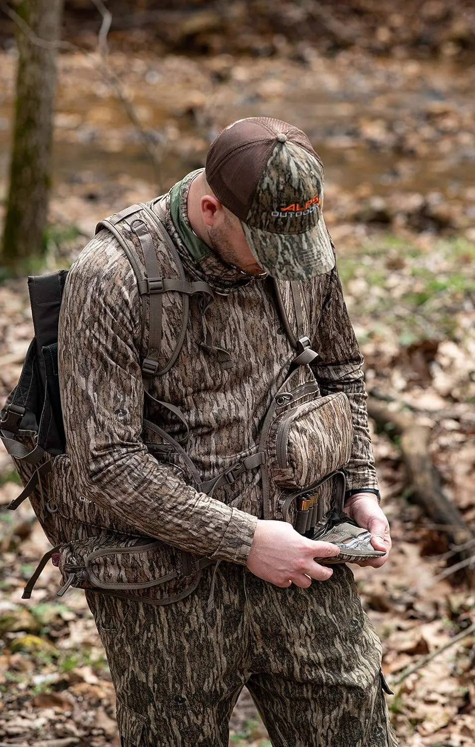 ALPS OutdoorZ Impact Camo Turkey Vest with Removable Flip Down Seat, Game Bag and Plenty of Pockets for Calls and Strikers