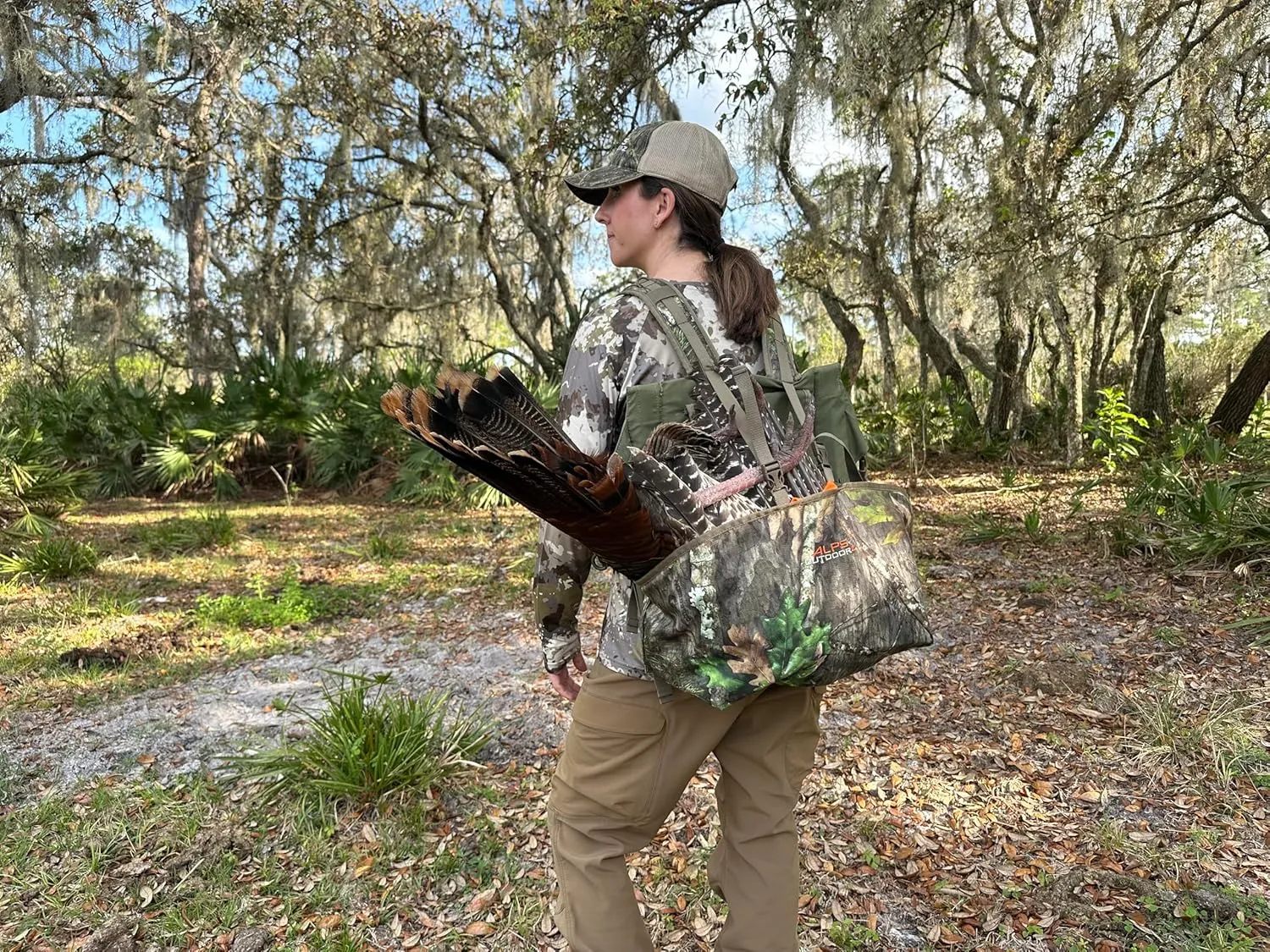 ALPS OutdoorZ Impact Camo Turkey Vest with Removable Flip Down Seat, Game Bag and Plenty of Pockets for Calls and Strikers