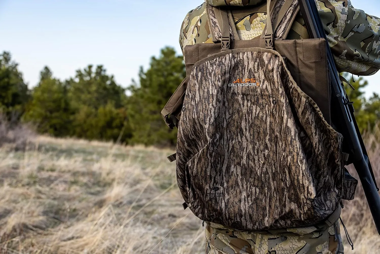 ALPS OutdoorZ Impact Camo Turkey Vest with Removable Flip Down Seat, Game Bag and Plenty of Pockets for Calls and Strikers